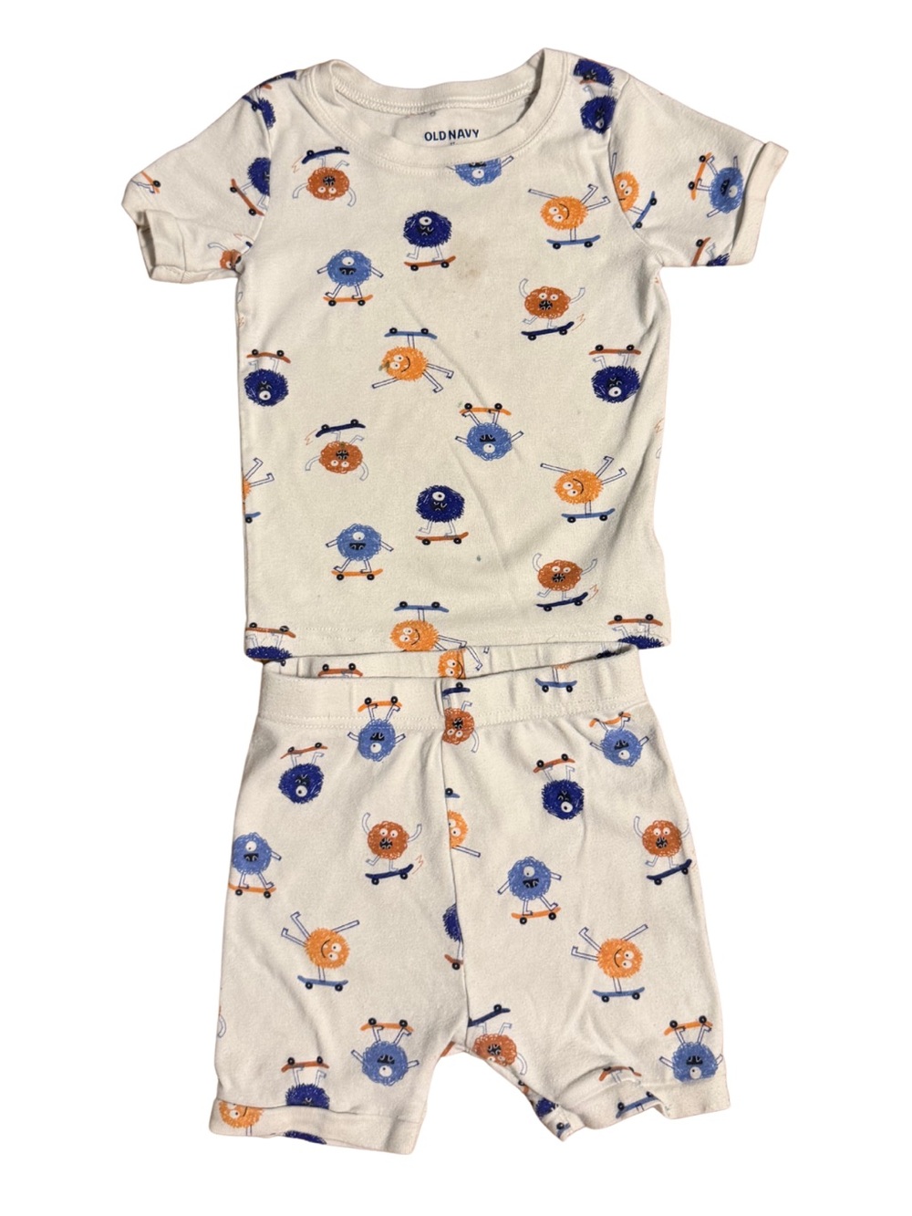 Old Navy Cream Pajama Set with Blue & Orange Monster Skate Pattern